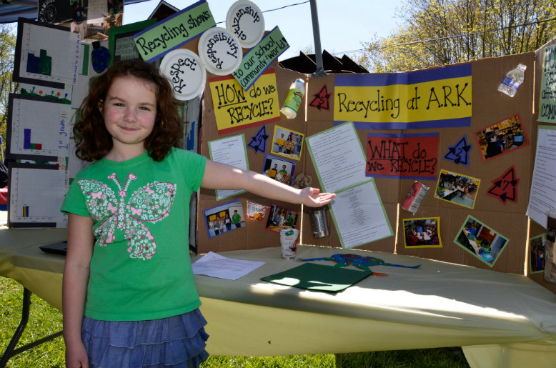 A student from A. Russell Knight Elementary School in Cherry Hill shows how to recycle at the 2013 festival. Courtesy of Sustainable Cherry Hill 