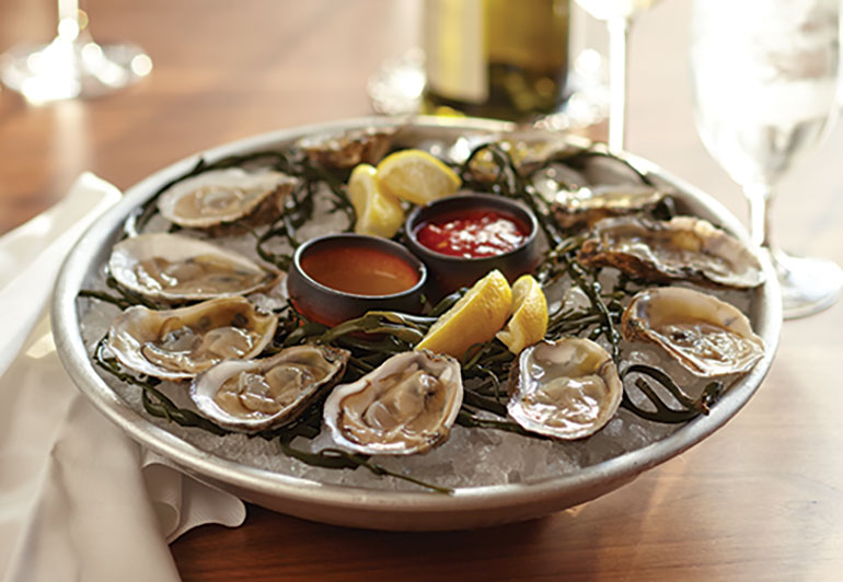 Oyster platter with white wine.