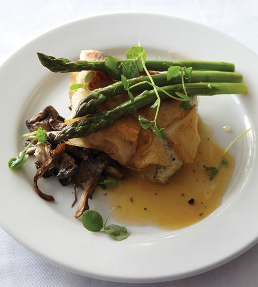 Potato-crusted halibut with chanterelle fricassee.