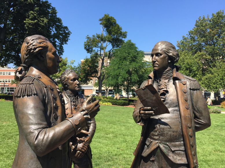 A statue on the Morristown Green commemorates a meeting between George Washington, Alexander Hamilton and the Marquis de Lafayette. Photo by Maryrose Mullen.