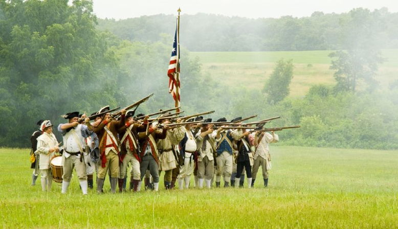 A reenactment of the Battle of Monmouth at Monmouth Battlefield State Park. Photo courtesy of Flickr Creative Commons: zhengxu.