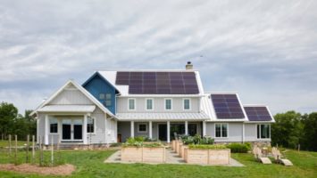 Exterior of Cold Brook Farm in Hunterdon County showcases solar panels on roof