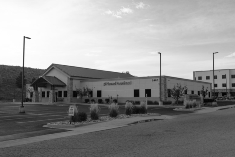 A black-and-white photograph of the Planned Parenthood in Colorado Springs that was the site of a 2015 mass shooting