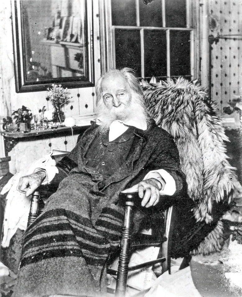 Black and white photo of Walt Whitman at his Camden home