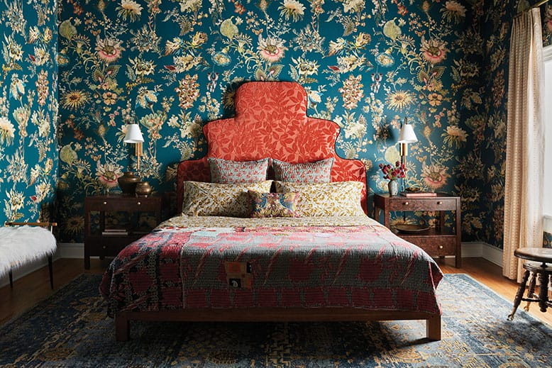 A colorful, heavily patterned bedroom in a Lumberton home