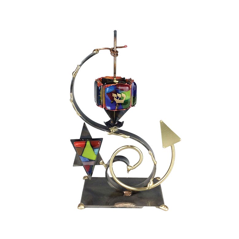 Judaica piece featuring blended metals and a fused glass dreidel from WheatonArts in Millville