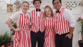 Show Place waitstaff in red and white–striped costumes.