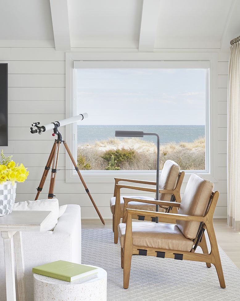 Stone Harbor living room window boasts a waterfront view