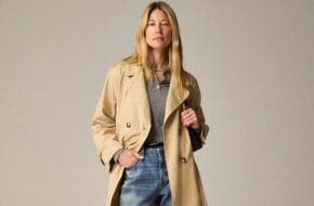 Woman in trench coat and jeans