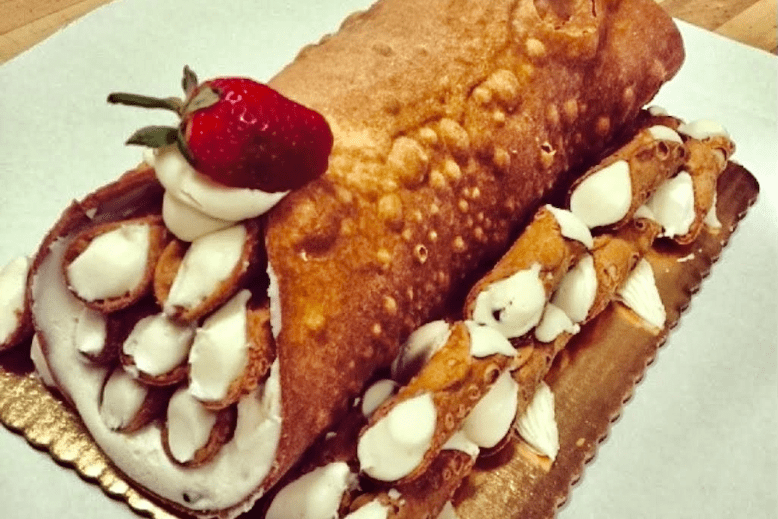 The foot-long Christmas cannoli at Lyndhurst Pastry Shop