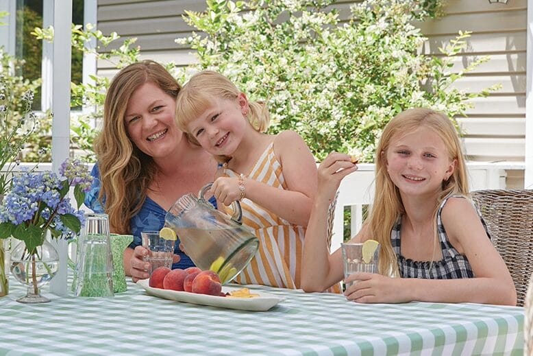 Stylist Dana Dore and her daughters celebrate summer with a lemonade party in the backyard of their Farmingdale home. Photo: Laura Moss