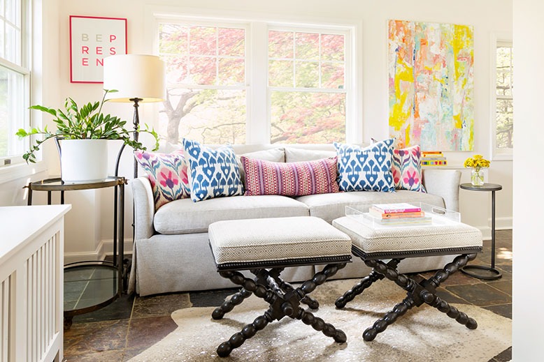 Designer Alexa Ralff's Maplewood neutral sunroom is adorned with colorful accessories