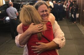 Donna Gray of Bruce Funds hugs "Springsteen on Broadway" ticket recipient Aniko