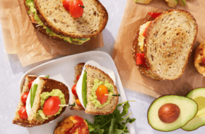 Assorted sandwiches featuring guacamole, tomatoes and avocado