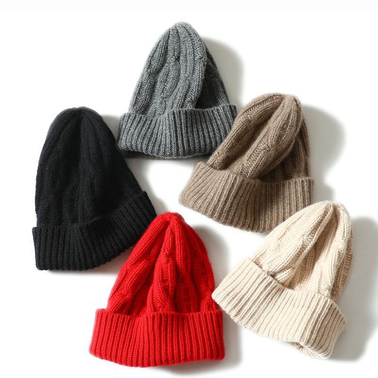 Assorted knit cashmere hats in various colors