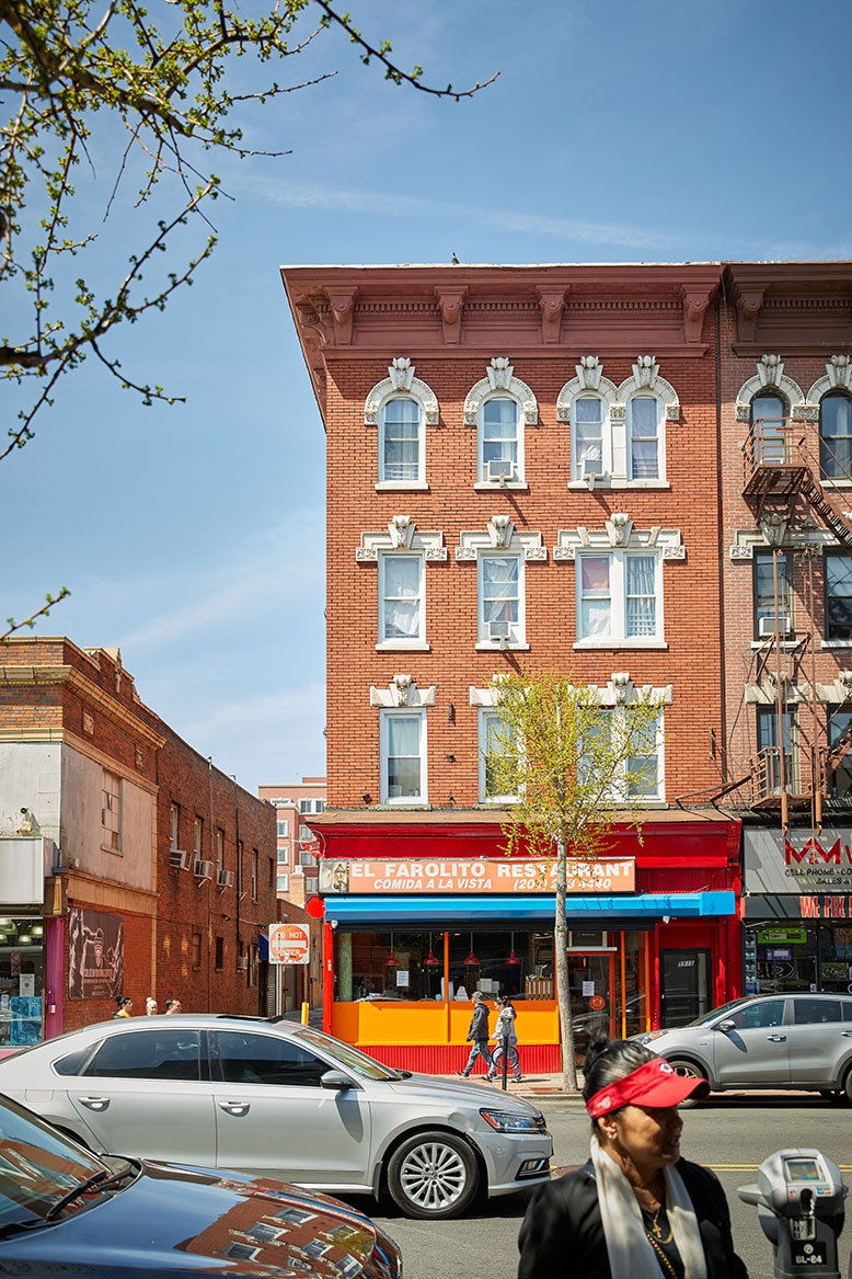 Storefronts, cars and pedestrians on Hudson County’s Bergenline Avenue