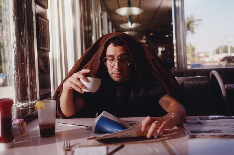 Jack Antonoff in a diner booth