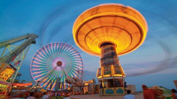 Rides on the boardwalk in Wildwood at dusk