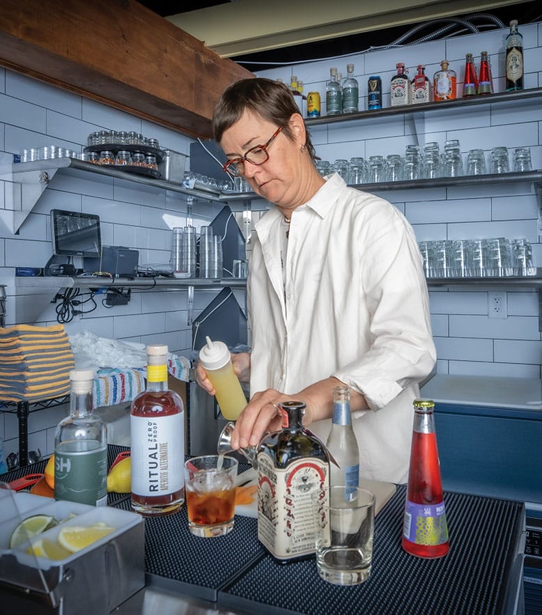 Aimée McElroy mixes up a Pathfinder Spritz mocktail at Catbird in Asbury Park
