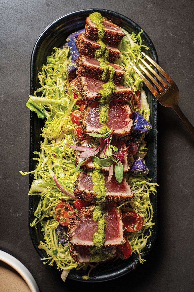 Coriander-crusted tuna, served with purple potatoes and a frisée salad, at Centrada in Red Bank