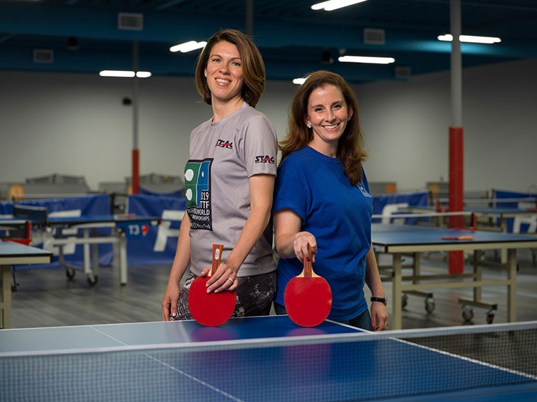 Two women at Ping-Pong table