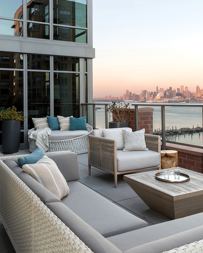 A Hoboken terrace with a waterfront view of the NYC skyline