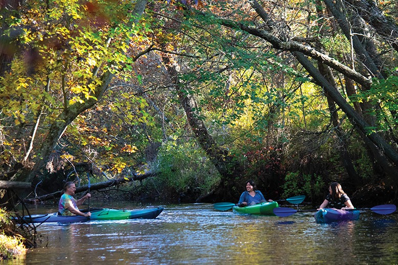 A family kayaks on New Jersey's Mullica River 