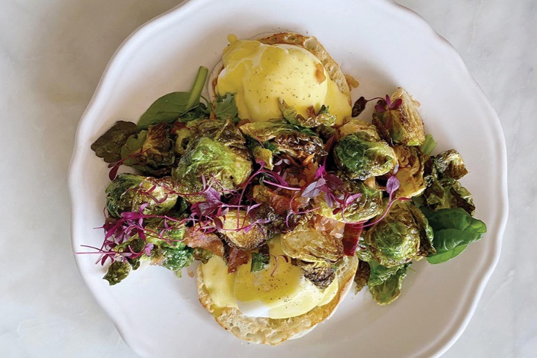 Eggs Benedict topped with Brussels sprouts at Maeberrie Market in Avon-by-the-Sea.