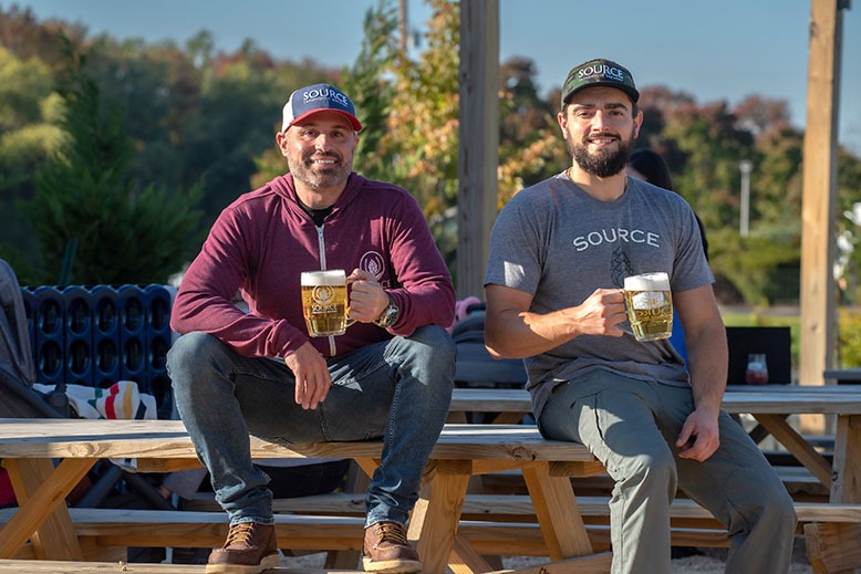Co-owners of Source Farmhouse Brewery in Colts Neck enjoy the property’s inviting outdoor area