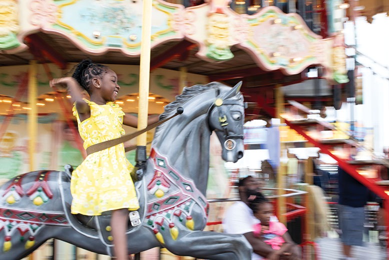 Young girl on carousel at Steel Pier in Atlantic City.