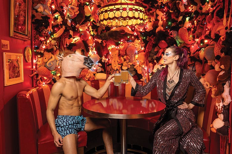 Woman with a costumed man having a drink at the Horse Dive Bar at Caesars, located in the lobby of "The Hook" in Atlantic City