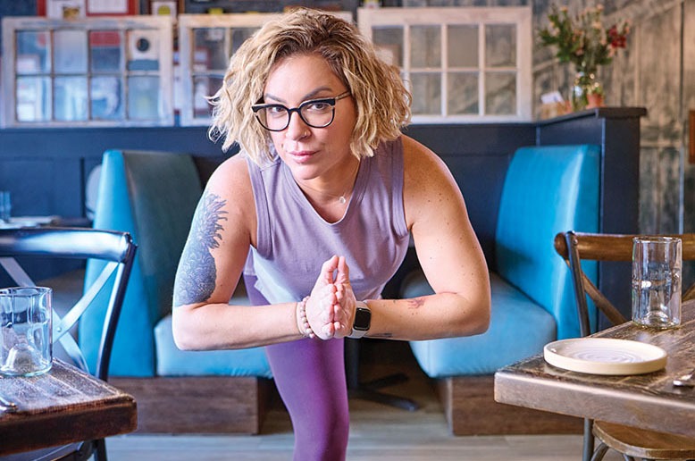 Leia Gaccione, chef/owner of South + Pine in Morristown, does yoga in her restaurant