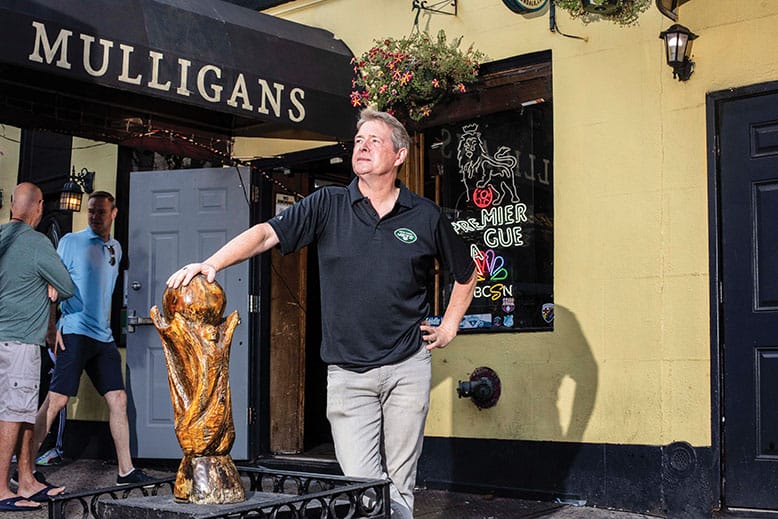 Owner Paul Dawson outside his Mulligan's Pub in Hoboken