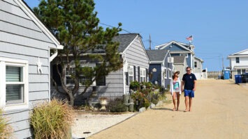 Kevin and Lisa Iredell walk the sandy streets of Ocean Beach II