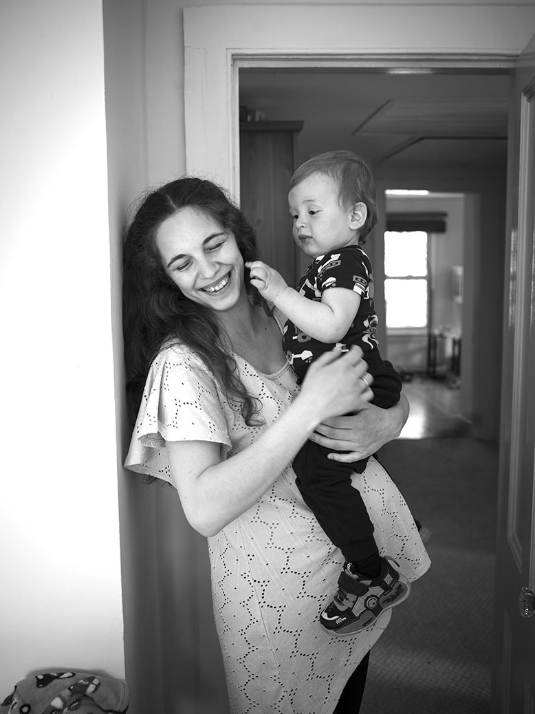 The Chernets family's oldest child Anya, 23, holds her son David