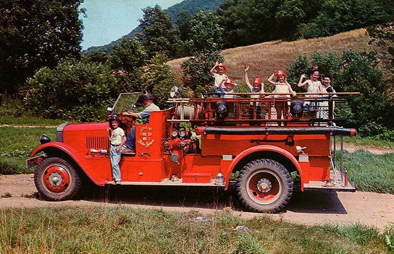 Children play on a fire engine at Land of Make Believe in Hope in the 1950s.