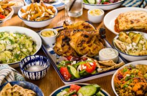 A table full of Greek food.