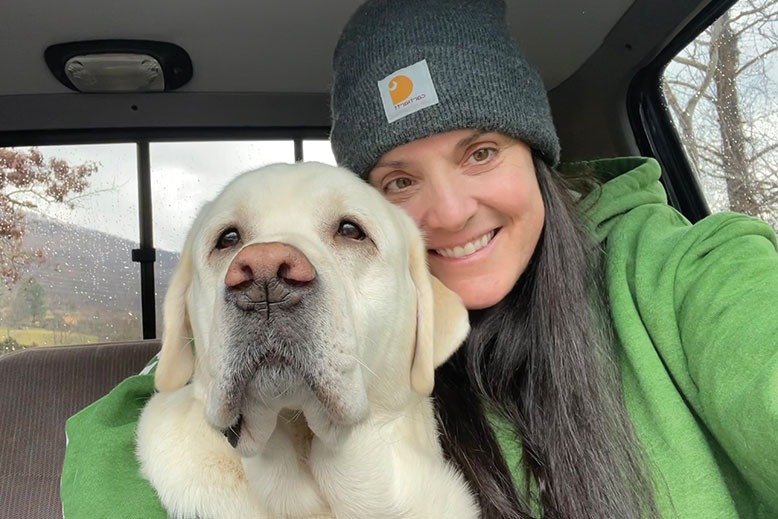 Nicole Asher and a rescued dog