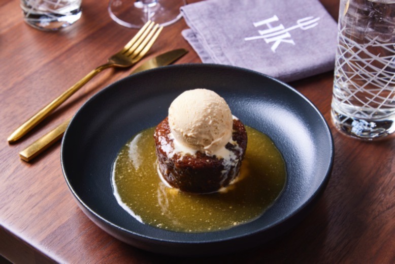 The sticky toffee pudding, topped with ice cream, at Hell's Kitchen in Atlantic City