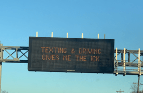 A digital sign on a Jersey highway that reads, “Texting and driving gives me the ick.”