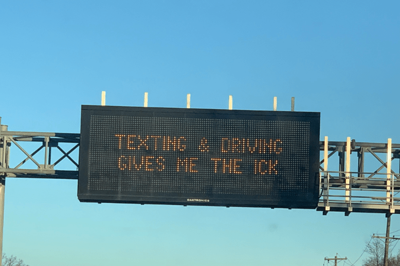 A digital sign on a Jersey highway that reads, “Texting and driving gives me the ick.”