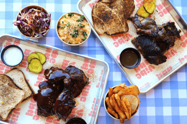Assorted dishes from celebrity chef Marcus Samuelsson's Vibe BBQ in Newark