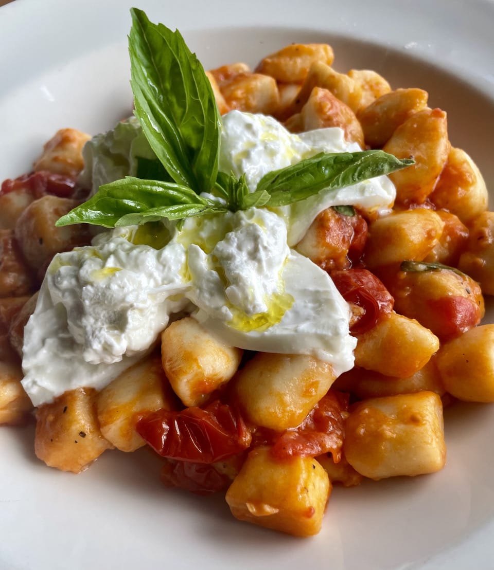 Gnocchi in tomato sauce topped with burrata and basil at Villa Barone in Collingswood