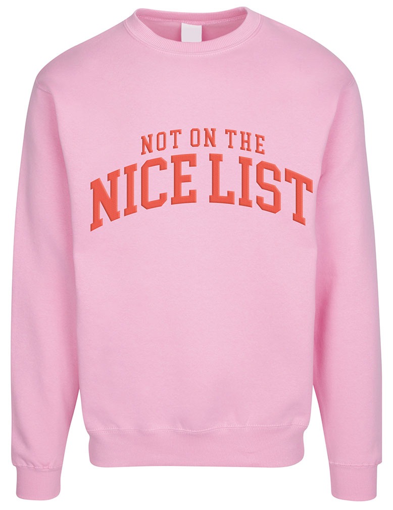Pink sweatshirt with red text that reads, "NOT ON THE NICE LIST"