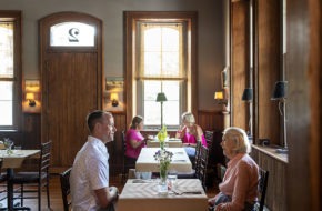 Patrons dine in Canal House Station in Milford, in what used to be the train station's waiting room