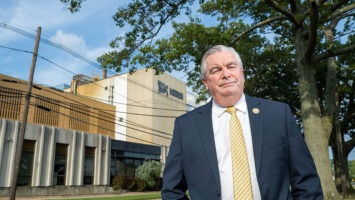 Freehold Mayor Kevin Kane in front of the Nescafé plant in Freehold