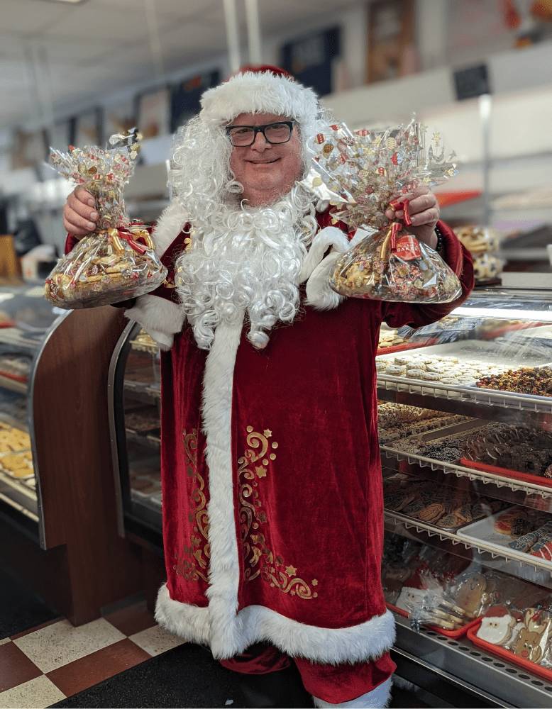 Chef David Burke in a Santa costume