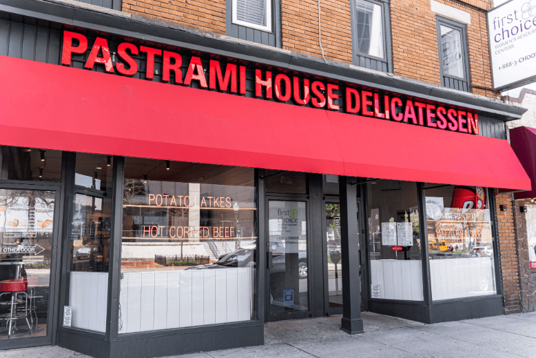 Red and black exterior of Pastrami House Delicatessen in Morristown