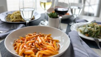 Pasta with glasses of water and wine at Promenade in Avon-by-the-Sea