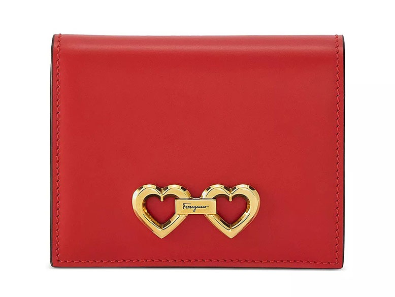 Red leather wallet with gold heart embellishment